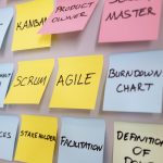 Agile keywords on Post-It notes including Scrum, Agile, Burndown Chart, Product Owner